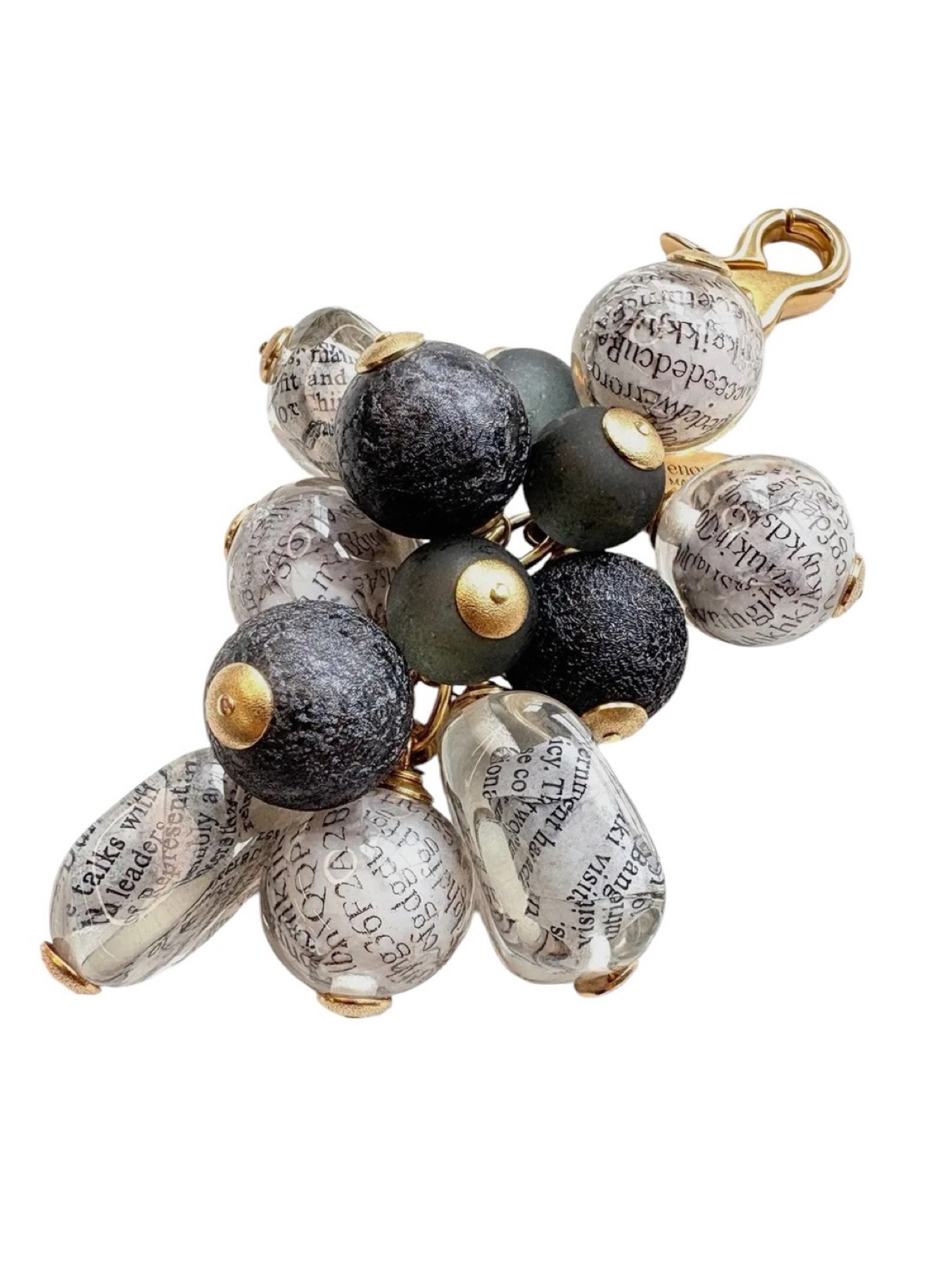 Lenora Dame newspaper-bead bag charm with gold hardware